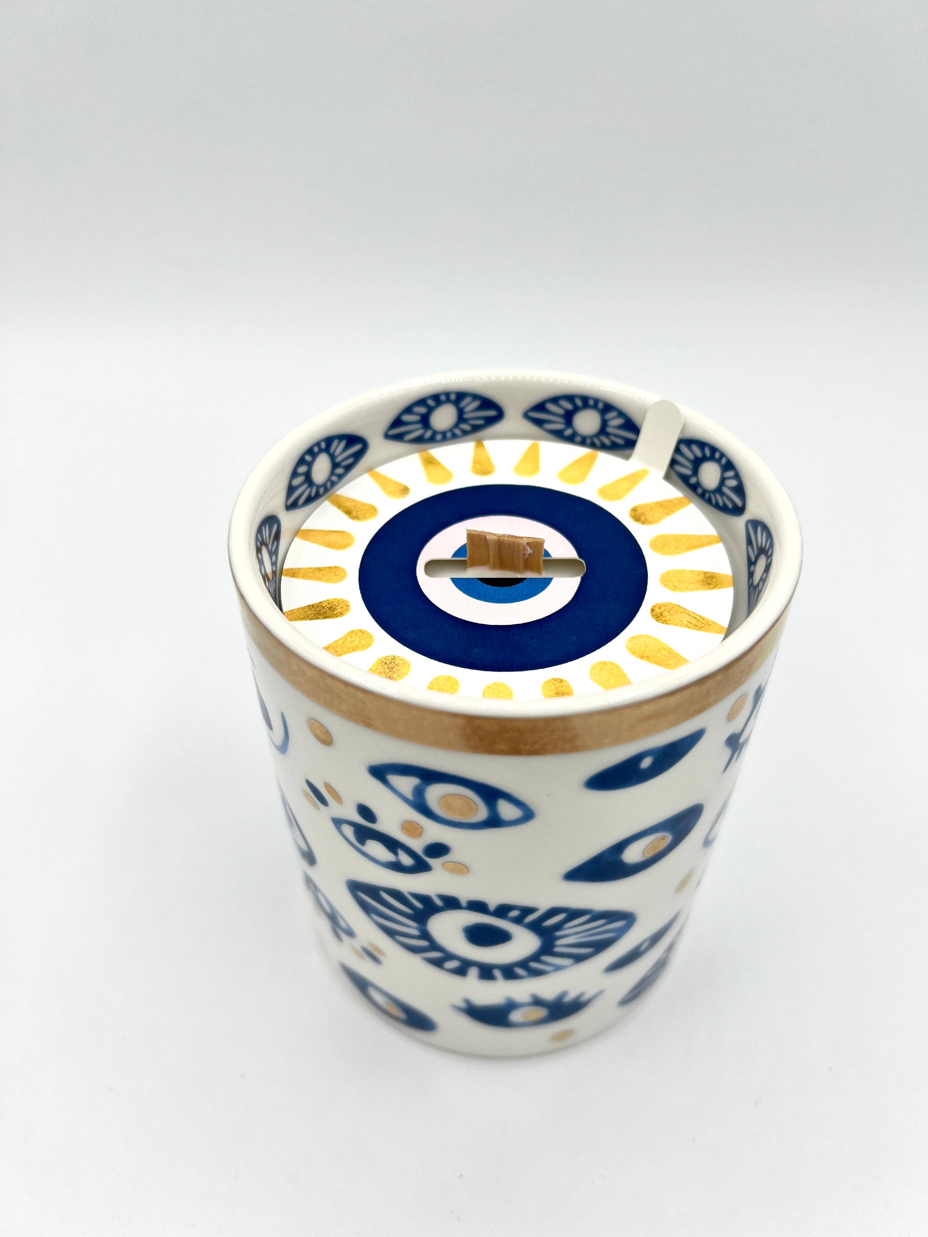The Sacred Wild Candle Company Beautiful Gold, Blue & White Ceramic "Evil Eye" Candle